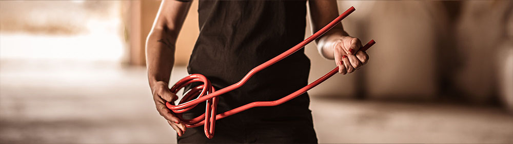 Close-up of someone holding a Väderstad tine in their hands