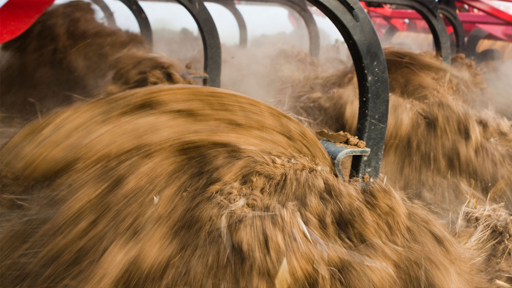 Closeup of Väderstad MixIn shins working the soil