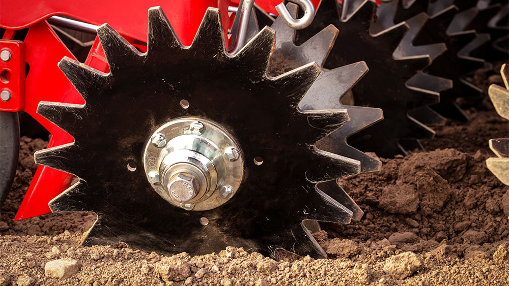 Closeup of a pointed closing wheel on Väderstad Proceed V24