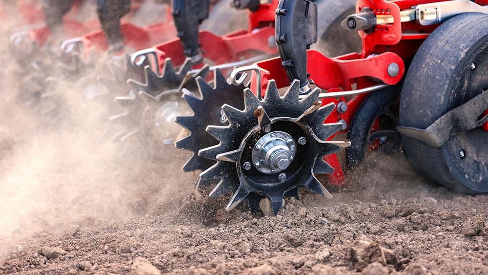 Close-up of ProDrain combined with  a pointed closing wheel on Väderstad Proceed V24