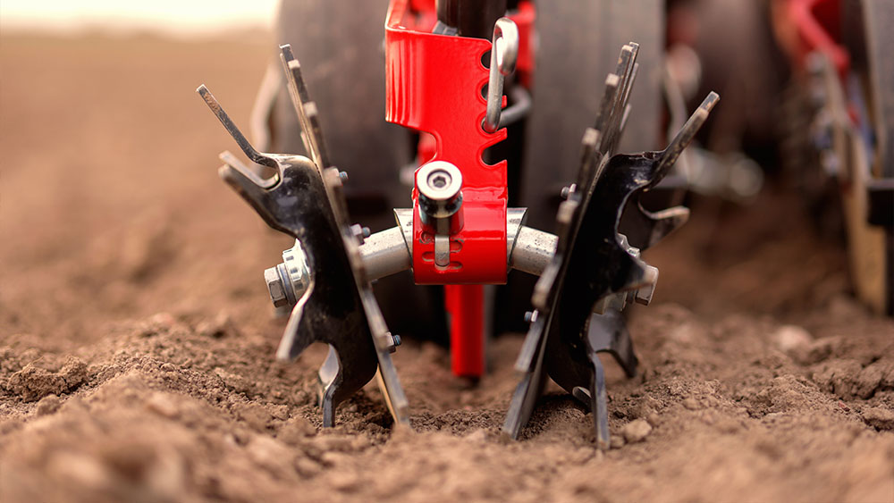 Closeup of ProDrain combined with  a pointed closing wheel on Väderstad Proceed V24