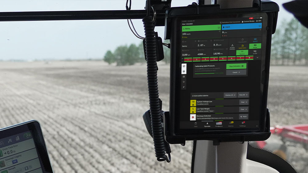 iCon Wireless Control System on an iPad in a tractor