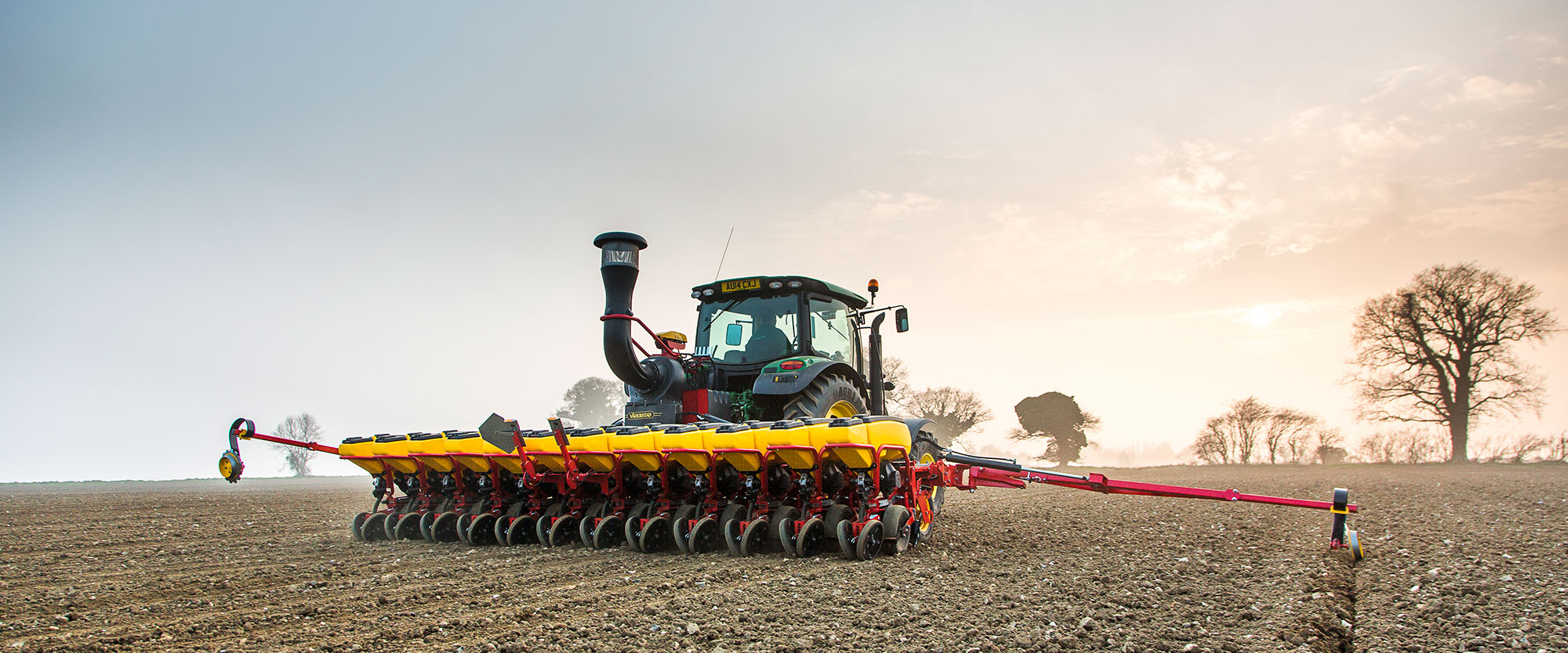 Väderstad Tempo V 12 rows in field during sunrise